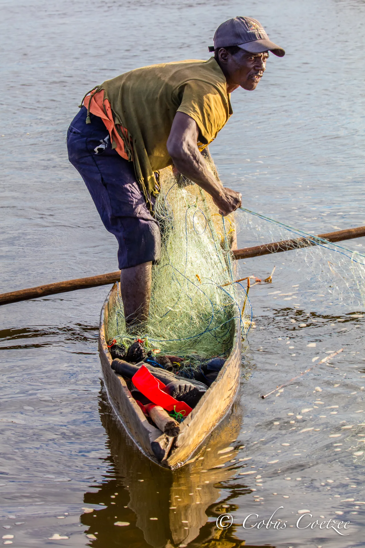 Fisherman, Zambezi River, Namibia Fisherman, Zambezi River, Namibia